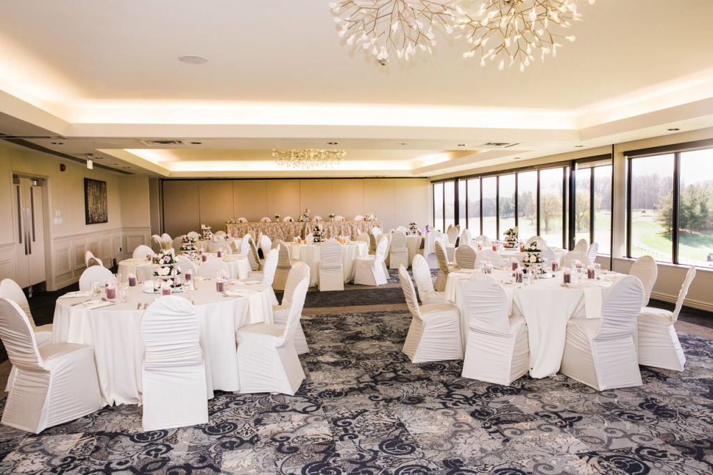 banquet room with big windows looking out to the course